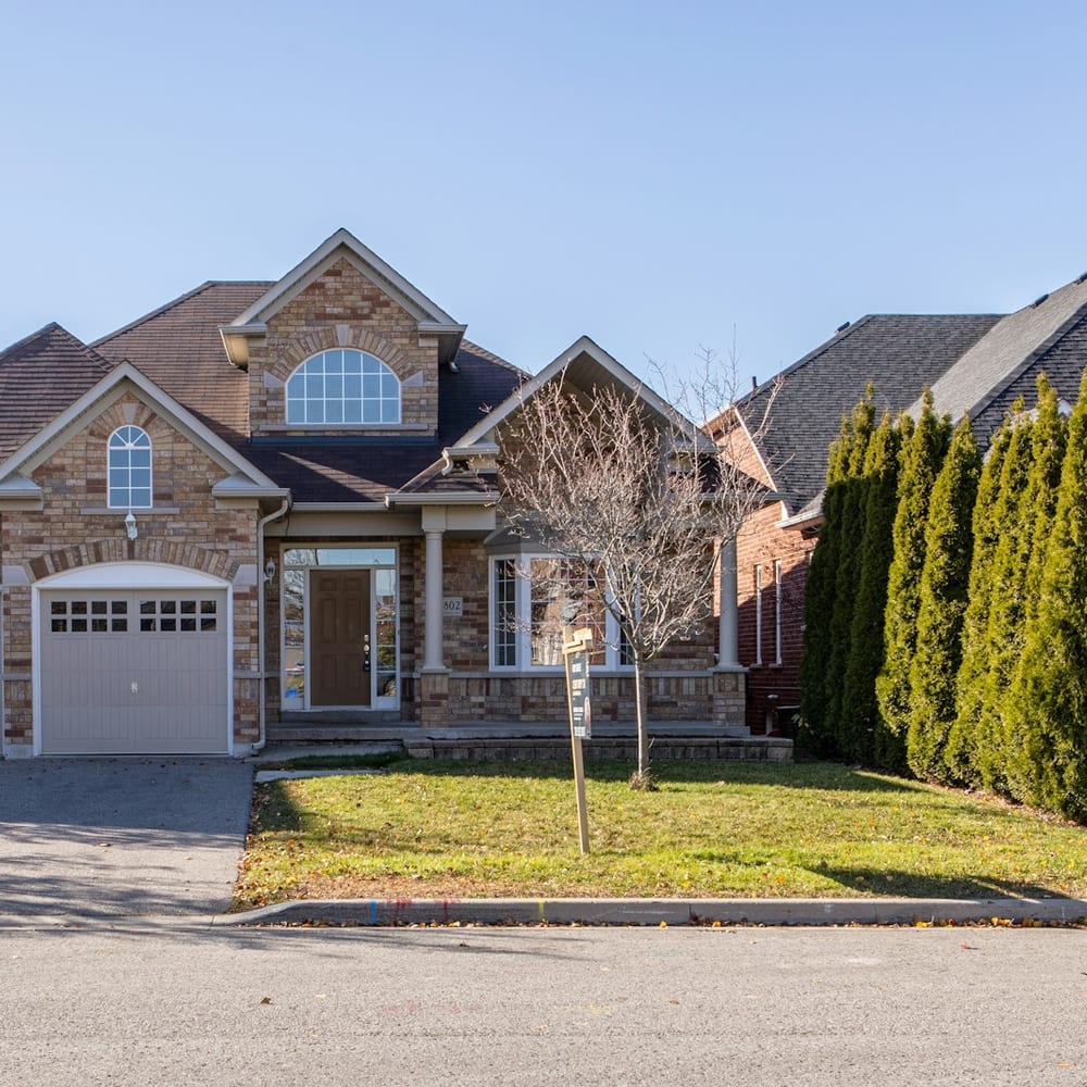 A brick family home on a quiet Ontario street